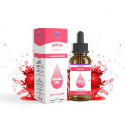 Flacon d'huile CBD Strawberry Diesel 25% avec sa boîte, fond éclaboussures de fraises rouges.