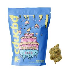 Un sachet bleu illustré d’un gâteau rose « Wedding Cake », accompagné d’une fleur de chanvre.