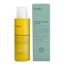 Flacon d'huile de massage au CBD Hemêka de 100 ml, accompagné de sa boîte verte.