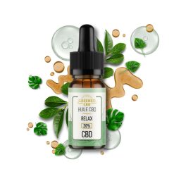 Flacon d'huile CBD Relax 20 % Greeneo entouré de feuilles vertes et de gouttes d'huile.