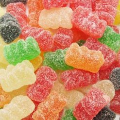 Bonbons en forme d'oursons de différentes couleurs, enrobés de sucre.