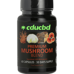 Flacon noir de compléments alimentaires "Premium Mushroom Blend" avec logo CDUCBD et illustrations de champignons adaptogènes.