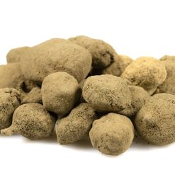 Moonrocks thv n10, petites boules recouvertes de pollen, à l’aspect poudreux et irrégulier.